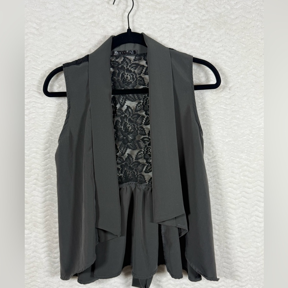 Must Have Black and Gray Lace vest with tie in the back. Size medium.